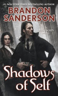 Mass market paperback of Shadows of Self by Tor Books, featuring the book cover with dark and mysterious artwork.