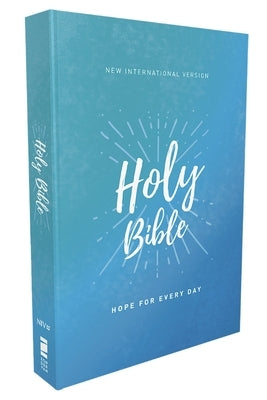 Zondervan Niv Holy Bible Economy Edition paperback with Comfort Print, open to show scripture pages and cover design.