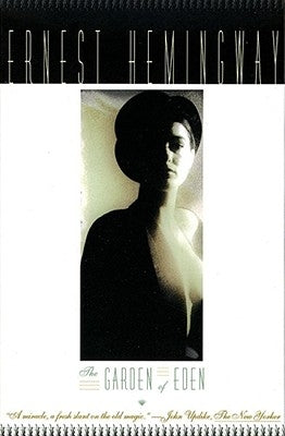 Paperback copy of The Garden of Eden novel by Scribner Book Company, showing the front cover with artistic design.