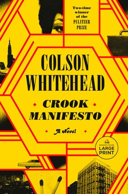 Paperback copy of Crook Manifesto by Random House Large Print Publishing, featuring the book cover with title and author details.