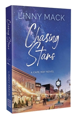 Paperback of "Chasing Stars," a friends to lovers small town romance by Page & Vine, showing the book cover with starry night design.