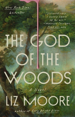 Paperback of The God of the Woods novel by Penguin Publishing Group featuring illustrated cover artwork.