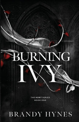 Paperback copy of "Burning Ivy: A Dark Mafia Romance" by Night Bloom Press LLC, featuring dark, moody cover art with ivy design.