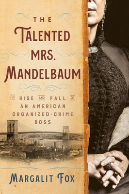 Paperback book titled "The Talented Mrs. Mandelbaum" by Random House Trade, featuring a cover image with text and design.