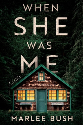 Paperback of "When She Was Me" by Poisoned Pen Press, featuring the book cover with title and author details.