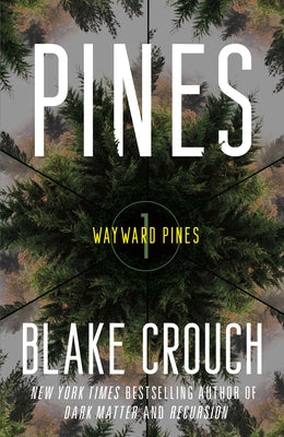 Paperback copy of Pines by Ballantine Books, featuring the book cover with title and author details.