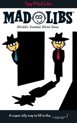 Open paperback of Spy Mad Libs: World's Greatest Word Game by Mad Libs, showing colorful pages with fill-in-the-blank fun.