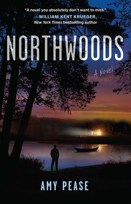 Paperback copy of Northwoods novel by Atria Books with a cover featuring a scenic forest landscape.