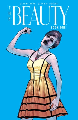 Paperback copy of The Beauty Book One by Ignition Press with a textured cover and elegant title design.