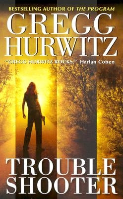 Troubleshooter mass market paperback book by HarperTorch showing a cover with abstract illustrations and bold typography.