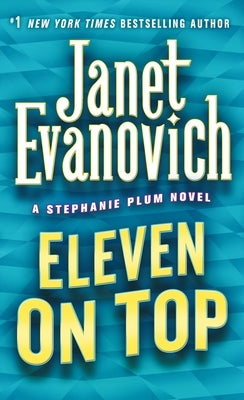 Mass market paperback of Eleven on Top book by Janet Evanovich, featuring a colorful cover with a woman and cityscape.