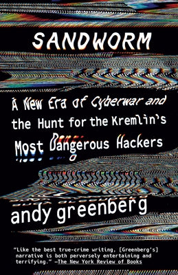 Paperback of Sandworm book by Anchor Books showing the cover with title and author, featuring a dark, digital-themed design.