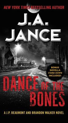 Mass market paperbound of "Dance of the Bones" novel by William Morrow & Company, featuring a dark, mysterious cover design.