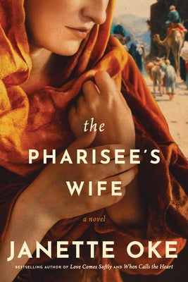 Paperback of The Pharisee's Wife novel by Tyndale Fiction, showing the book cover with title and author details.