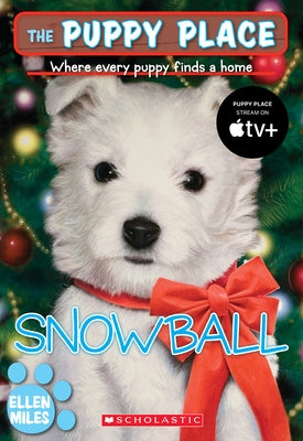 Paperback copy of Snowball from The Puppy Place series by Scholastic Paperbacks, featuring a cute puppy on the cover.