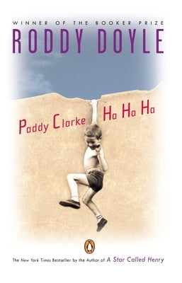 Paperback of Paddy Clarke Ha Ha Ha by Penguin Books, featuring the book cover with title and author details.