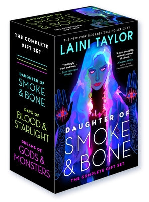 Paperback copy of Daughter of Smoke & Bone complete gift set by Little, Brown Books for Young Readers, showing colorful book covers.