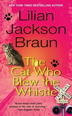 Mass market paperback of "The Cat Who Blew the Whistle" by Berkley Books, featuring a colorful cover with a cat illustration.