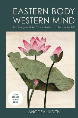 Paperback book titled "Eastern Body, Western Mind" by Ten Speed Press, featuring a cover with chakra symbols and spiritual imagery.