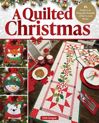 Open paperback book titled "A Quilted Christmas" by Landauer, showcasing holiday quilt project patterns on a wooden table.