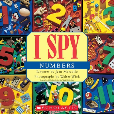 Paperback I Spy Numbers book by Cartwheel Books featuring colorful pages with hidden numbers and playful illustrations.