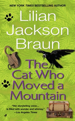 Mass market paperback of "The Cat Who Moved a Mountain" by Berkley Books, showing the book cover with title and author.
