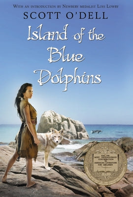 Paperback edition of "Island of the Blue Dolphins" by Houghton Mifflin, showing the book cover with ocean and island illustrations.
