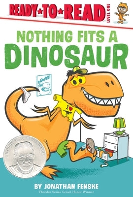 Paperback copy of "Nothing Fits a Dinosaur" by Simon Spotlight featuring colorful dinosaur illustrations on the cover.