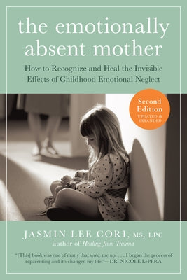 Paperback copy of "The Emotionally Absent Mother" by Experiment, featuring a book cover with title and author details.