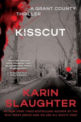 Paperback copy of "Kisscut: A Grant County Thriller" by William Morrow & Company, featuring the book cover with title and author.