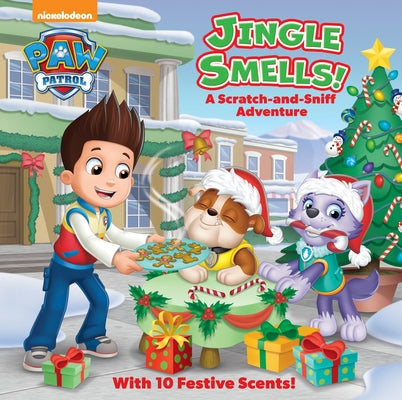 Paperback children's book titled Jingle Smells! from Paw Patrol series, featuring holiday-themed scratch-and-sniff illustrations.