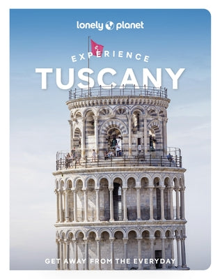 Paperback Lonely Planet Experience Tuscany guidebook showing a scenic Tuscany landscape on the cover.