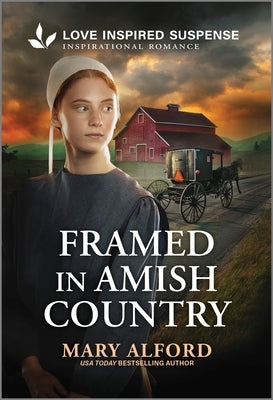 Mass market paperbound book titled "Framed in Amish Country" by Love Inspired Suspense, featuring a rural Amish scene on the cover.