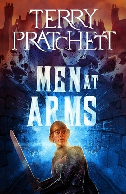 Paperback of Men at Arms: A Discworld Novel by Harper Paperbacks, showing the front cover with colorful fantasy artwork.