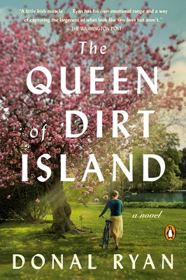 Paperback of The Queen of Dirt Island by Penguin Books, showing the book cover with colorful artwork and title text.