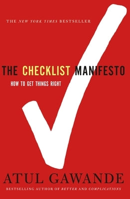 Paperback copy of The Checklist Manifesto by Metropolitan Books, featuring the book cover with title and author details.