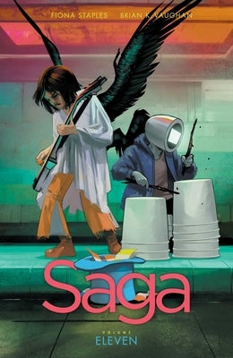 Saga Volume 11 paperback comic book by Image Comics featuring vibrant cover art and detailed illustrations.