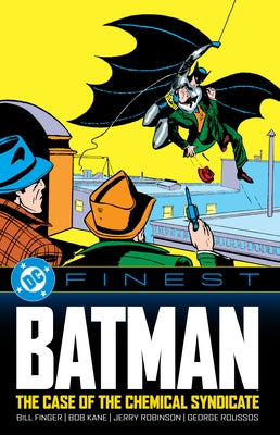 Paperback copy of DC Comics Batman: The Case of the Chemical Syndicate comic book featuring Batman and chemical plant scene.