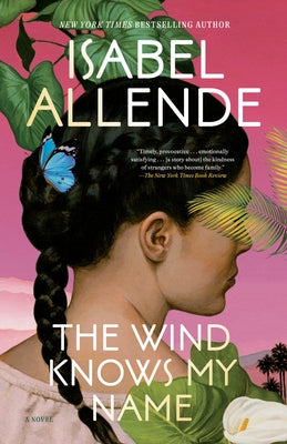 Paperback copy of "The Wind Knows My Name" by Random House Publishing Group, showing the book cover with title and author text.