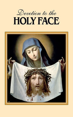 Paperback copy of "Devotion to the Holy Face" by Tan Books, featuring a religious cover with a sacred face image.