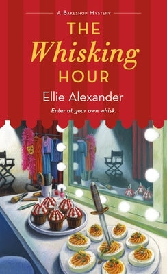 Cover of "The Whisking Hour: A Bakeshop Mystery" mass market paperback by Minotaur Books featuring a baking-themed design.