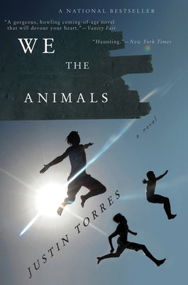 Paperback of "We the Animals" by Mariner Books featuring the book cover with bold title and artistic illustrations.