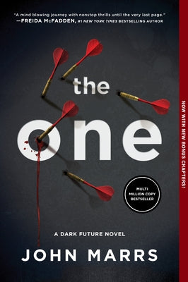 Paperback copy of The One Expanded Edition by Hanover Square Press, featuring a dark futuristic novel cover.