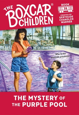 Paperback copy of "The Mystery of the Purple Pool" by Random House Books for Young Readers, featuring a colorful cover illustration.