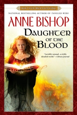 Paperback of Daughter of the Blood by Penguin Publishing Group, featuring the book cover with dark fantasy artwork.