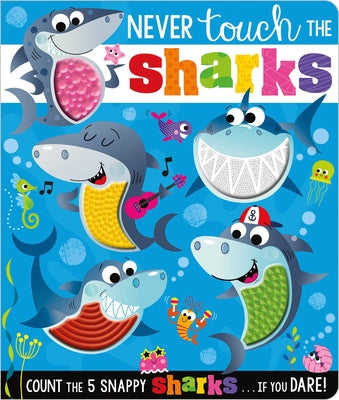 Colorful cover of the "Never Touch the Sharks!" board book by Make Believe Ideas, featuring playful shark illustrations for kids.