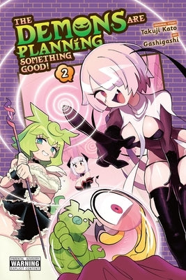 Paperback of "The Demons Are Planning Something Good! Vol. 2" manga by Yen Press, showing the cover with colorful demon illustrations.