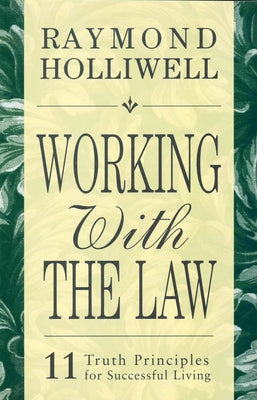 Paperback book titled "Working with the Law: 11 Truth Principles for Successful Living" by DeVorss & Company, open with pages visible