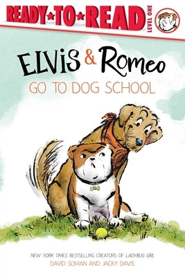 Paperback copy of Elvis & Romeo Go to Dog School: Ready-To-Read Level 1 by Simon Spotlight, showing the book cover with colorful illustrations.