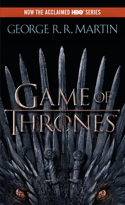 Mass market paperback of A Game of Thrones HBO Tie-In Edition by Random House Worlds, showing the book cover with medieval artwork.